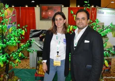 Lucia Baumbach and Cesar Garcia with New Mundo Export not only have mangos on display, but even mango trees.